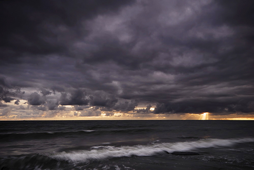 Stormy atmosphere at dusk on the Baltic coast of Ruegen Island, Mecklenburg-Western Pomerania, Germany, Europe