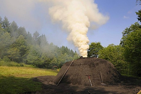 Smoking charcoal kiln, Walpersdorf, Kreis Siegen-Wittgenstein district, North Rhine-Westphalia, Germany, Europe