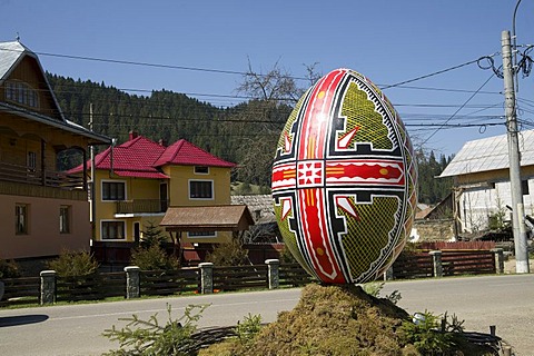 Oversized Easter egg as a sign to the Moldova convent, Vorone& Monastery, Eastern Carpathians, Romania, Europe