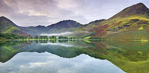 Mountains reflected on Buttermere Lake, refected in the water, Lake District, Cumbria, England, United Kingdom, Europe