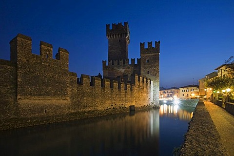 Castello Scaligero Scaliger Castle at night in Sirmione, Lake Garda, Lombardy, Italy, Europe