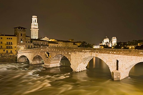 Ponte Pietra bridge with Verona Cathedral, Cattedrale di Santa Maria Matricolare or Duomo di Verona at night, Verona, Veneto, Italy, Europe