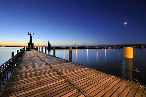 The harbor pier at Constance harbor port entrance just before dawn, tide gauge with the Imperia Statue on it, the town's landmark, district of Konstanz, Constance, Baden-Wuerttemberg, Germany, Europe