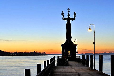 The harbor pier at Constance harbor port entrance just before dawn, tide gauge with the Imperia Statue on it, the town's landmark, district of Konstanz, Constance, Baden-Wuerttemberg, Germany, Europe