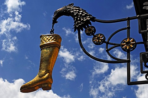 Hanging boot with eagle, advertising sign of a shoe store, Hochstrasse 8, Mittenwald, Upper Bavaria, Bavaria, Germany, Europe