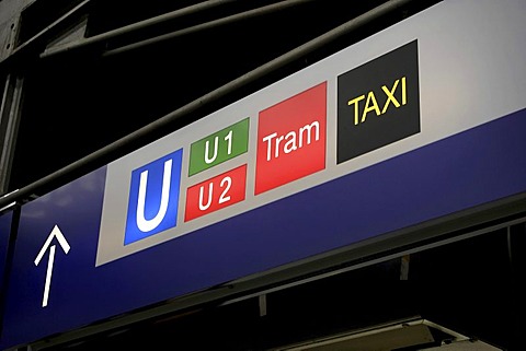 Train station sign showing directions to metro, tram and taxis, Munich, Upper Bavaria, Germany, Europe