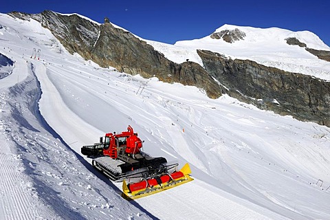 Snowcat on Mt. Mittelallalin, the summer ski resort of Saas Fee, Valais, Switzerland, Europe