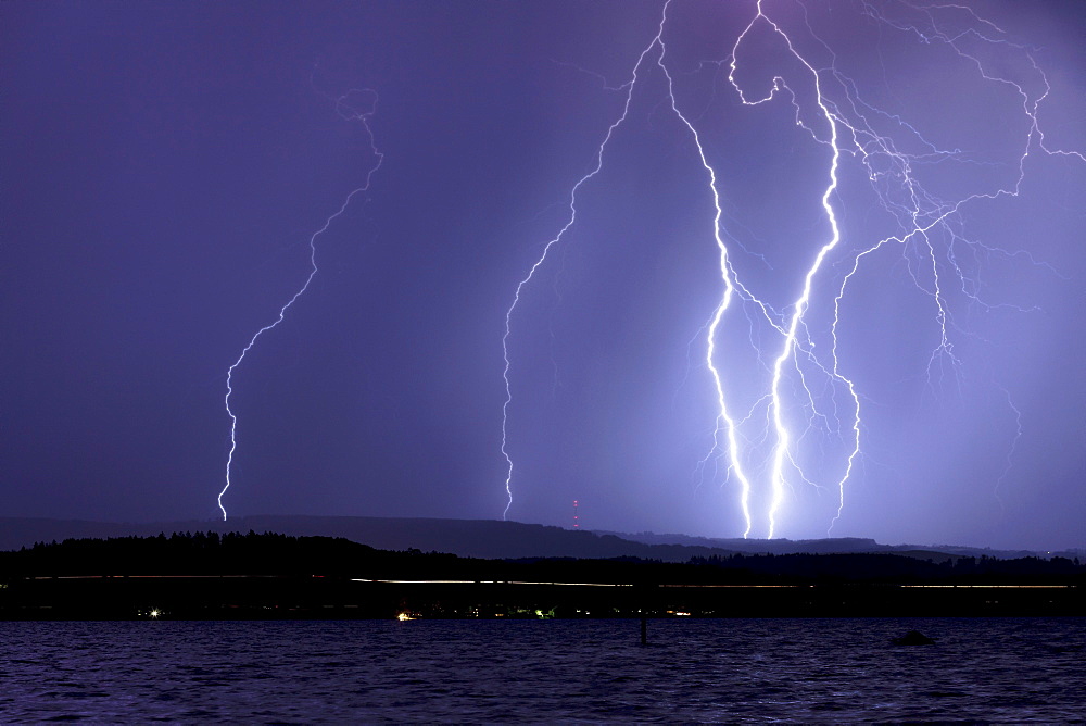 Thunderstorm and lightning at night on Lake Constance, Germany, Europe