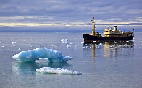 Cruise ship, ship behind an iceberg, Svalbard, Spitsbergen, Norway