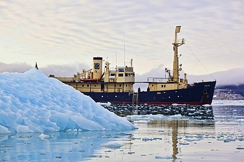 Cruise ship, ship behind an iceberg, Svalbard, Spitsbergen, Norway