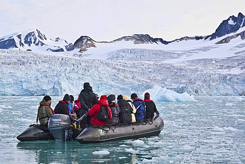 Ice, fjord, Zodiac rubber boat in the Fuglefjord in front of a glacier, Svalbard, Spitsbergen, Norway