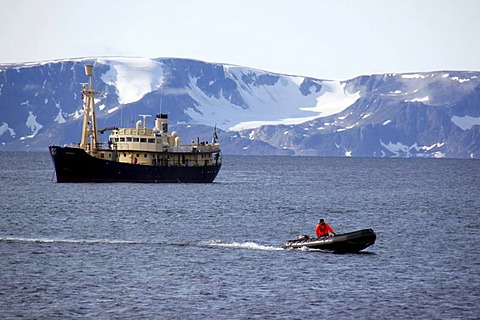 Cruise ship, Zodiac rubber boat in front of a ship, Svalbard, Spitsbergen, Norway