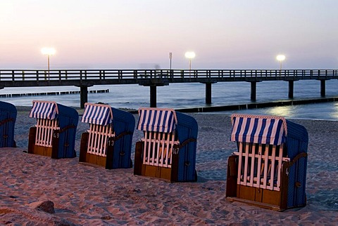 Beach chairs and pier on the beach of Kuehlungsborn on the Baltic Sea, Mecklenburg-Western Pomerania, Germany, Europe