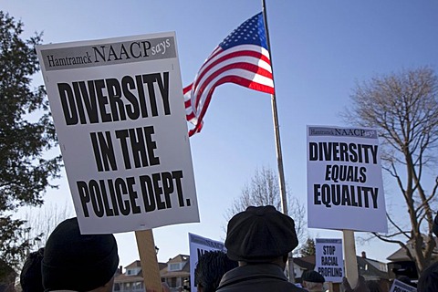 Residents rally at City Hall, asking that the city establish a citizens review board to monitor the police and increase the police force's diversity, Hamtramck, Michigan, USA