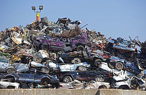 Junk cars crushed and ready for recycling at a scrap yard, Detroit, Michigan, USA