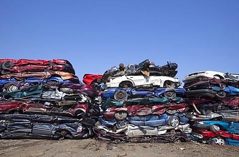 Junk cars crushed and ready for recycling at a scrap yard, Detroit, Michigan, USA