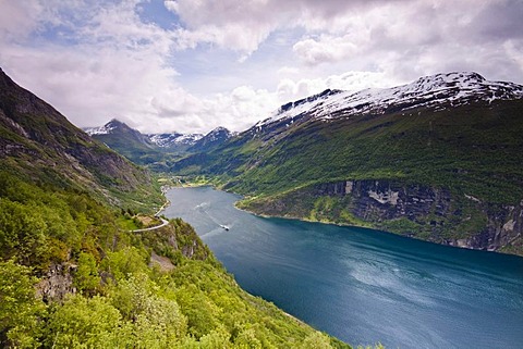 View of the Geiranger Fjord from the eagle eyes view ornesvingen with the town of Geiranger and the ferry to Hellesylt, Norway, Scandinavia, Europe