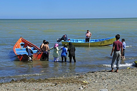 Iranian people on the beach of Ramsar, Caspian Sea, Mazandaran, Iran, Asia