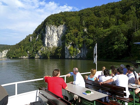 People on the deck of a passenger ship, gap of danube river, near Weltenburg, Altmuehltal Nature Park, Bavaria, Germany, Europe