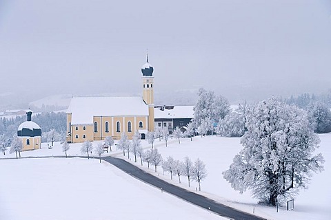 Church of Wilparting in a winter landscape, winterwonderland with hoar frost on Mt. Irschenberg, Bavaria, Germany, Europe