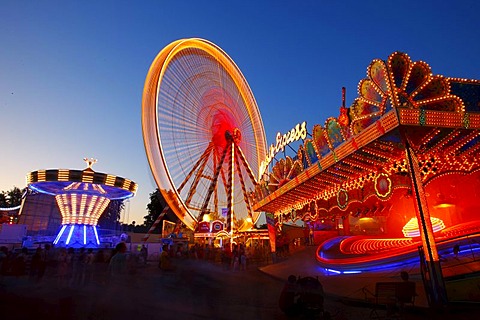 Ferris wheel, chairoplane, bumper cars, evening mood, folk festival, Muehldorf am Inn, Bavaria, Germany, Europe