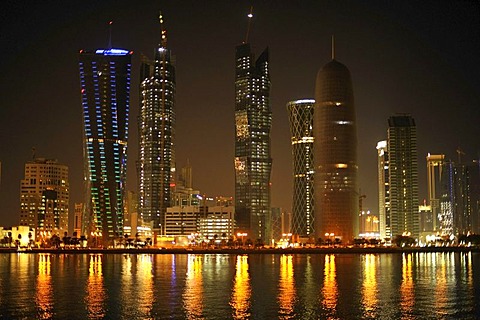 Night shot of the Doha skyline, Tornado Tower, Navigation Tower, Peace Towers, Al-Thani Tower, Doha, Qatar, Persian Gulf, Middle East, Asia