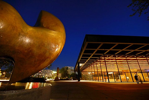 Neue Nationalgalerie national art museum by Mies van der Rohe with sculptures "The Archer" by Henry Moore, "Broken Obelisk" by Barnett Newman in the rear middle and a light installation by Jenny Holzer, Schoeneberg district, Berlin, Germany, Europe