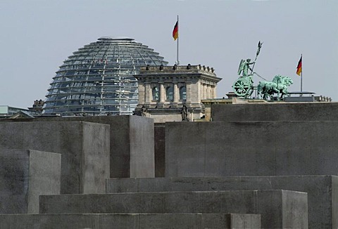 Holocaust Memorial designed by architect Peter Eisenman, memorial to the murdered jews of Europe, with a view of the Quadriga on the Brandenburg Gate and the dome of the Reichstag parliament, Tiergarten district, Mitte district, Berlin, Germany, Europe