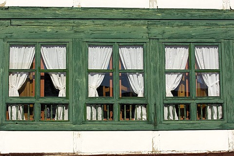 Windows of a house on Main Square dating from 13th century, Almagro, Ciudad Real province, Castilla-La Mancha, Spain, Europe