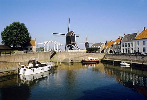 Romantic port with windmill, old fortified town of Heusden on the Maas river, North Brabant, Holland, Netherlands, Europe