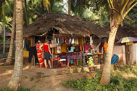 Sewing hut under palms in the south of Kovalam, Kerala state, India, Asia