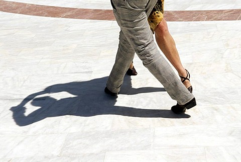 Legs of a couple dancing tango