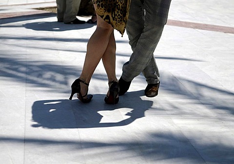 Legs of a couple dancing tango