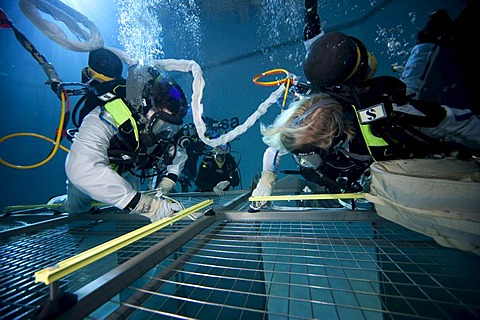 Backup divers and astronauts practicing with a space station module reproduction in a diving basin, European Space Agency, ESA, European Astronaut Center, EAC, Cologne, North Rhine-Westphalia, Germany, Europe