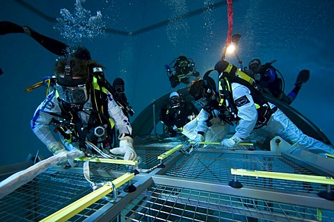 Backup divers and astronauts practicing with a space station module reproduction in a diving basin, European Space Agency, ESA, European Astronaut Center, EAC, Cologne, North Rhine-Westphalia, Germany, Europe