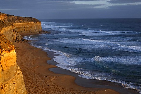 Evening light on Gibson Steps, limestone cliff and beach, Great Ocean Road, Port Campbell National Park, Victoria, Australia