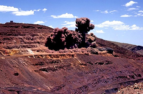 Blasting for iron ore, Hamersley iron ore mine, Tom Price, Pilbara, Western Australia, Australia