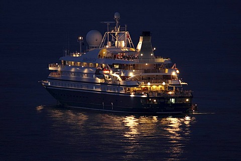 Cruise ship Sea Dream II of the SeaDream Yacht Club at night off Monaco, Principality of Monaco, the Cote d'Azur, Europe