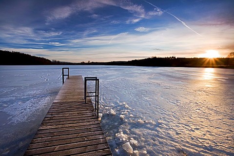 Ice-covered Mindelsee lake in the last evening light, Baden-Wuerttemberg, Germany, Europe