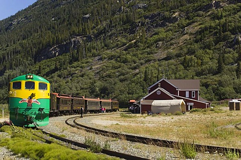 Historic White Pass & Yukon Route train leaving Bennett station, historic Bennett, Chilkoot Pass, Chilkoot Trail, Yukon Territory, British Columbia, B. C., Canada