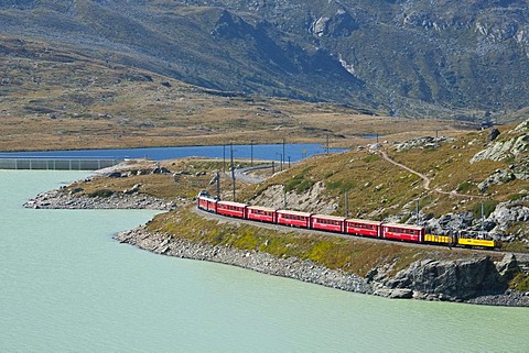 Rhaetische Bahn, Rhaetian Railway on the Bernina Pass, Lago Bianco lake, Engadin, Grisons, Switzerland, Europe