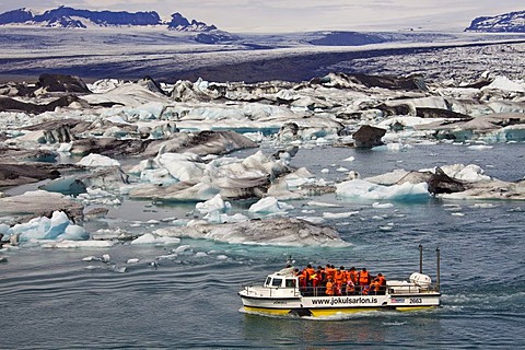 Amphibious vehicle with tourists on board on the Joekulsarlon glacial lake, Joekulsarlon, Vatnajoekull, Iceland, Europe