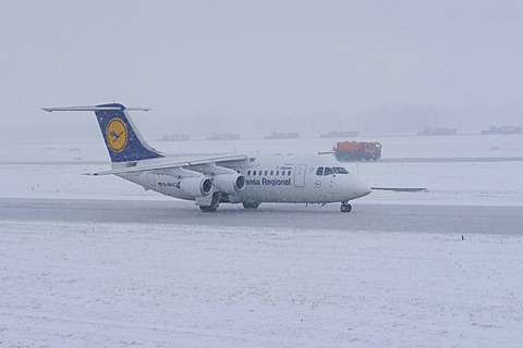 Snow, winter, Lufthansa airplane, snow removal with a jet sweeper, taxiway and runway, Munich Airport, MUC, Bavaria, Germany, Europe