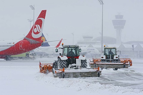 Snow, winter, snow removal with tractors, aircraft, taxiway, control tower, Terminal 1, west apron, Munich Airport, MUC, Bavaria, Germany, Europe