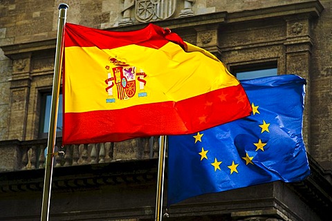 Spanish national flag and the flag of the European Union in front of the Spanish embassy in Berlin, Germany, Europe