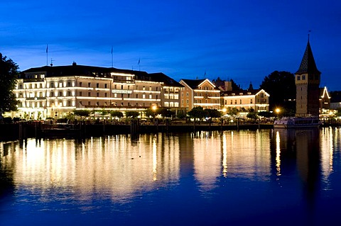 Illuminated buildings and Mangturm tower at the harbor, Lindau, Lake Constance, Bavaria, Germany, Europe