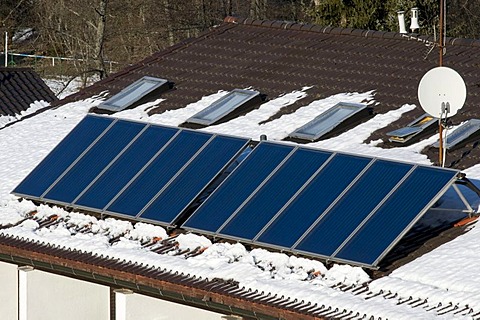 Roof with solar cells and patches of snow, Bayerisch Eisenstein, Bavarian Forest, Bavaria, Germany, Europe