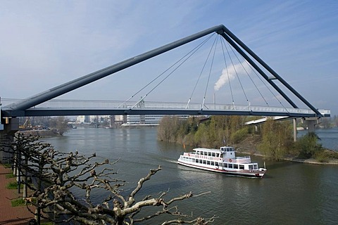 Pedestrian bridge and excursion boat on the Rhine, Medienhafen, Media Harbour, Duesseldorf, state capital of North Rhine-Westphalia, Germany, Europe