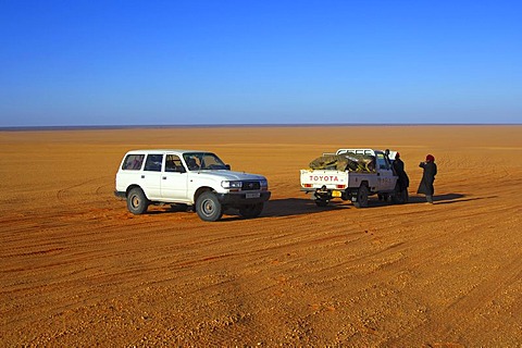 Broken down car in the desert, waiting for the towing service, Sahara, Libya, Africa