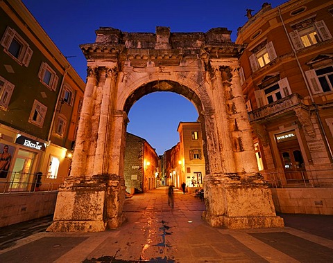 Triumphal Arch of the Sergii at night in Pula, Croatia, Europe